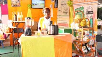 POUR L&rsquo;ACHAT DES JUS DE FRUITS ET SIROPS A LA FOIRE DE PARAKOU : Le stand K180 de la société Amdagri pour vous servir